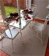 Smeedijzeren tafel met glazen blad en 6 stoelen - 0 - Thumbnail