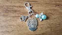 Sleutelhanger Papillon silver plated met geluksengeltje NIEUW