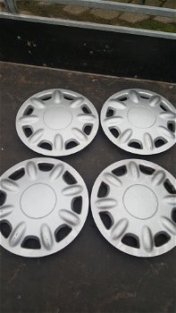 Winterbanden+Velgen+Wieldoppen Opel Corsa 15Inch - 0