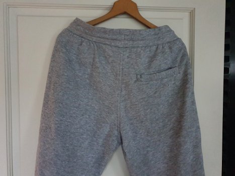 Divided H&M licht grijze joggingbroek met witte bies maat M - 0