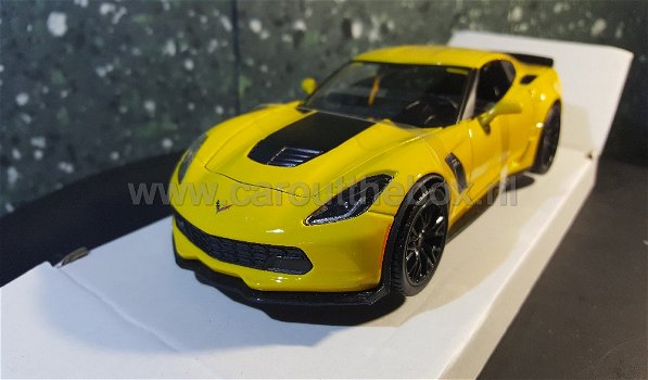 Chevrolet Corvette z06 2015 geel 1:24 Maisto - 1