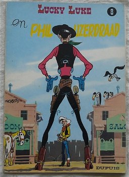 Strip Boek, LUCKY LUKE, En Phil IJzerdraad, Nummer 8, Dupuis, 1977. - 0