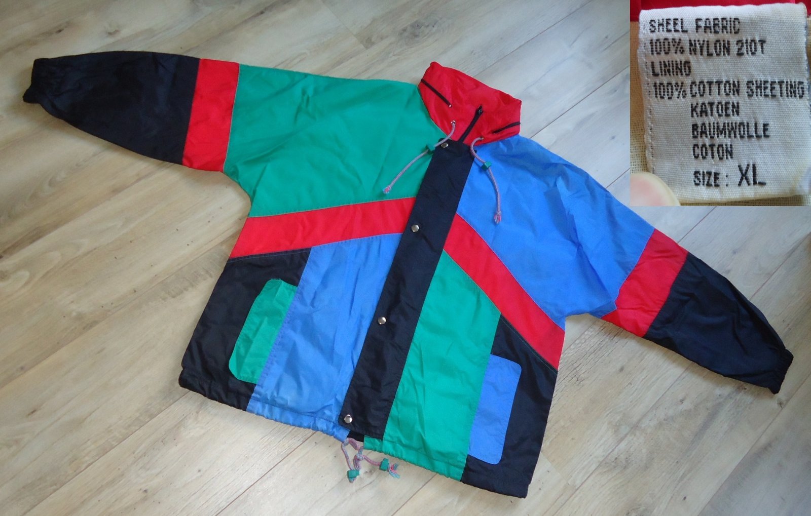 Een kleurig regenjack van 100% nylon met voering (maat: XL). - Afbeelding 7