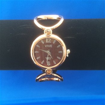 Rose gold Klemband horloge bruine achtergrond - 0