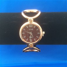 Rose gold Klemband horloge bruine achtergrond