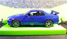 Nissan Skyline GT-R (R34) blauw 1:24 Welly