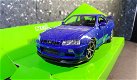 Nissan Skyline GT-R (R34) blauw 1:24 Welly - 1 - Thumbnail