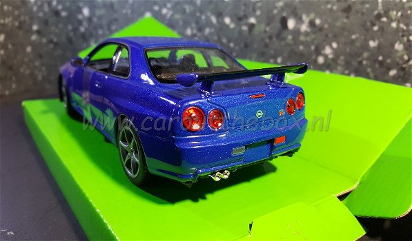 Nissan Skyline GT-R (R34) blauw 1:24 Welly - 2