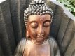 Beeld van boeddha met handgebaar zittend in een tempel - 1 - Thumbnail