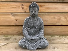 Boeddha mediterend, dreamlike, stenen figuur, tuindecoratie