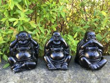 Zwarte boeddha beelden - horen, zien en zwijgen - steen