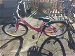 24 inch meisje fiets Kleur roze met versnellingen en terug traprem en handrem - 0 - Thumbnail