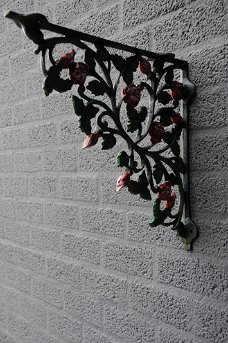 Mooie schapdrager-hanger rozen motief, gietijzer-kleur