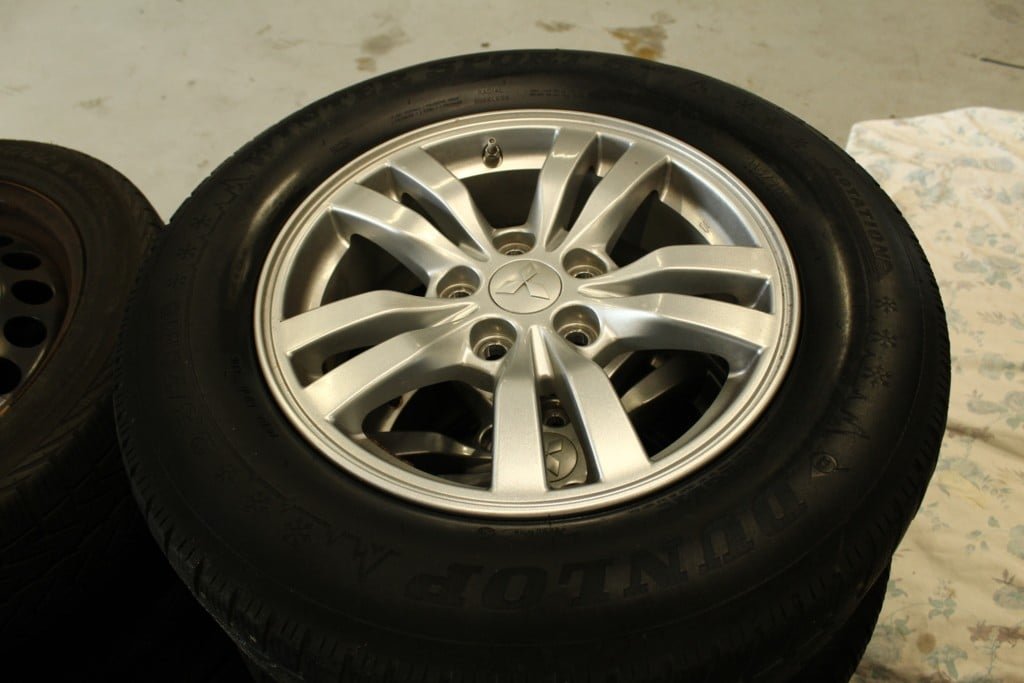 ad: 10. LM Mitsubishi velgen met winterband4x 215/70/16 5x110 - nr. 1