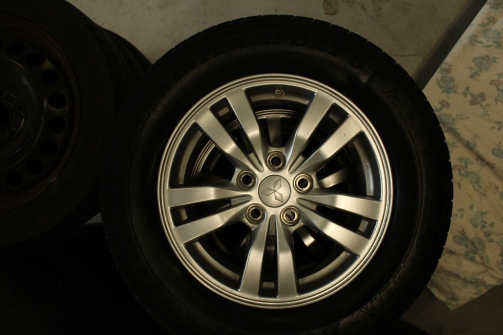 ad: 10. LM Mitsubishi velgen met winterband4x 215/70/16 5x110 - Afbeelding 2