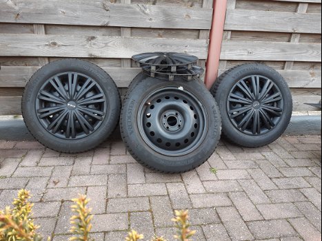 Winterbanden met velg en wieldoppen 175/65/R15 steek 100mm - 0