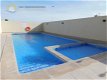 Nieuw rijtjeshuis met gemeenschappelijk zwembad - 1 - Thumbnail