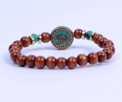 Armband uit Nepal met Mantra en houten kralen - 1