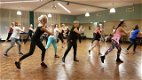 Dans je fit en slank met Zumba bij Dance Passion - 1 - Thumbnail