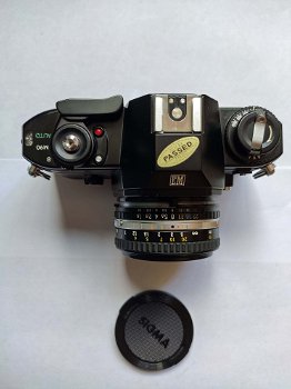 Nikon EM met originele lens, boekje en motor drive in super nieuw staat zonder krasjes - 1
