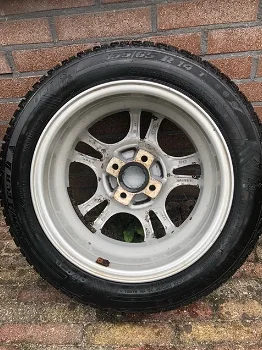 Winterbanden met aluminium velgen 155/65 R14 T - 1