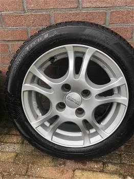 Winterbanden met aluminium velgen 155/65 R14 T - 6