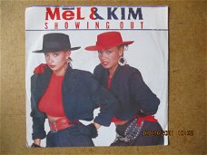 a2402 mel and kim - showing out