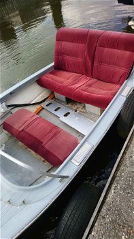 Speedboot met buitenboord motor - 1