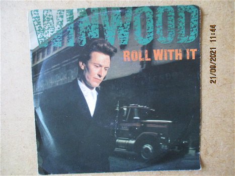 a3915 steve winwood - roll with it - 0