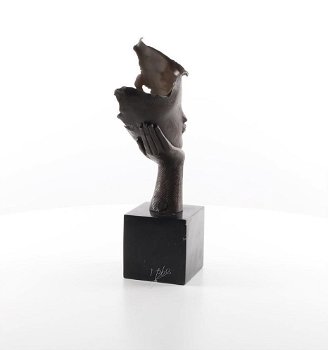 brons beeld van een hoofd rustend op een hand-handen - 6