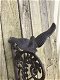 Een sierlijke deurbel met een vogel erop, van gietijzer - 4 - Thumbnail