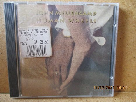 adver308 john mellencamp - human wheels - 0