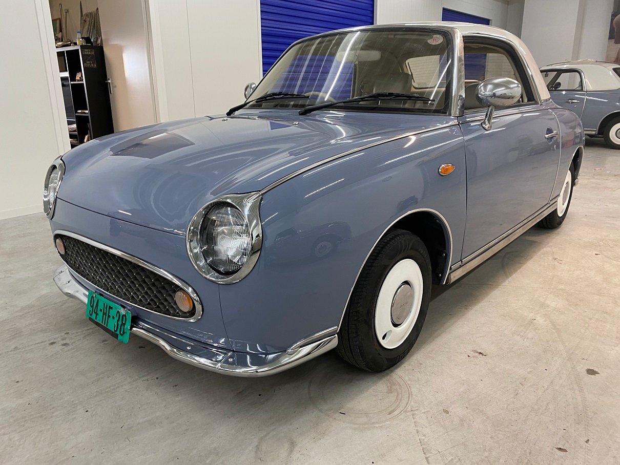 Hele mooie Nissan Figaro in Lapisgrijs uit Japan afkomstig - nr. 1