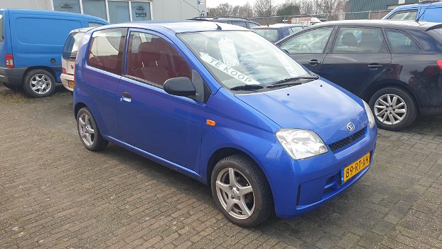 Hele nette Daihatsu Cuore 1.0 2005 APK 24-01-23 lage kmstand NAP - 1