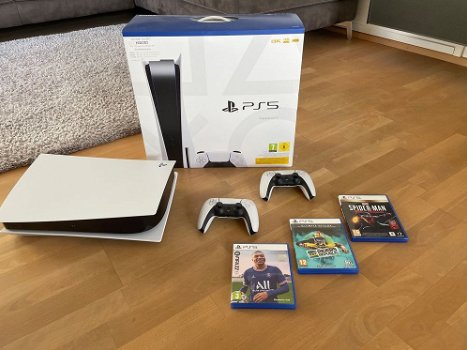 Ps5-versie disc + 2 controllers en games - 0