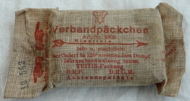 Verband Pakje / Verbandpäckchen, Wehrmacht / Heer, voor in uniformjasje, jaren'30/'40.(Nr.1) - 0