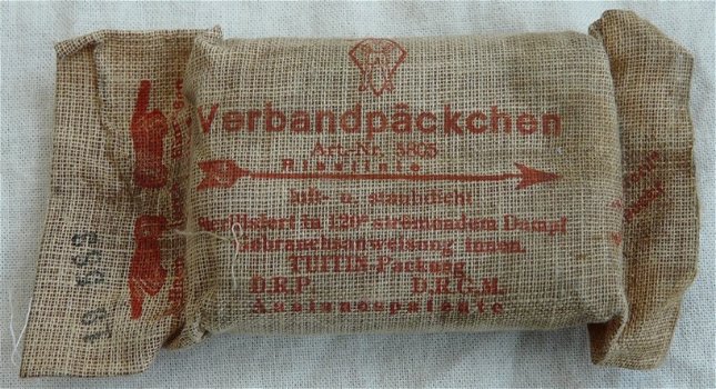 Verband Pakje / Verbandpäckchen, Wehrmacht / Heer, voor in uniformjasje, jaren'30/'40.(Nr.1) - 1