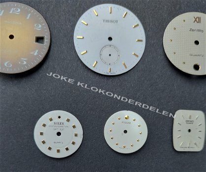 = 25 Horloge wijzerplaatjes = 47700 - 5