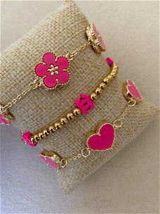 Roze met gouden klaver bedel armband met bloem ibiza hip
