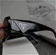 Prada unisex zonnebril in zwart - 2 - Thumbnail