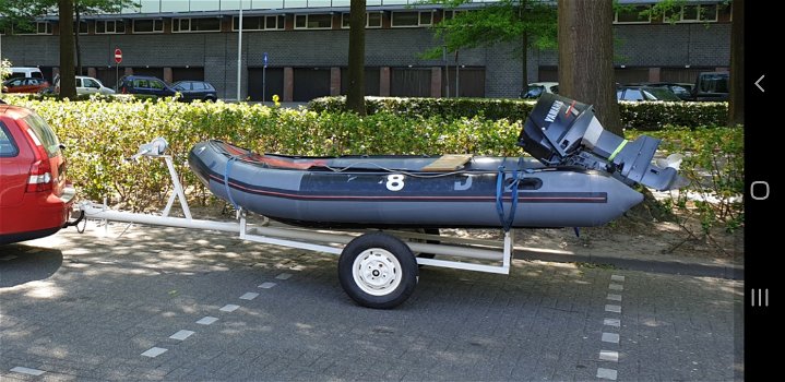 Leuke rib boot, vrij lang / groot en harde bodem - 0