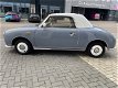 303 Hele mooie Nissan Figaro in Lapisgrijs - 2 - Thumbnail