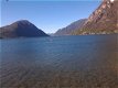 Chalet DIRECT aan meer van Lugano in Porlezza Noord Italie - 1 - Thumbnail