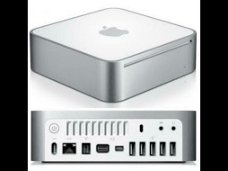 Mac Mini  YM008BA29G5 en Time Capule met 2 Terrabyte opslag en een Apple Mighty Mouse Enz.