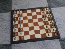 schaakspel , messing