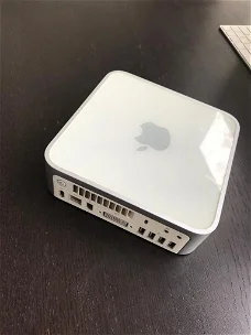 Mac Mini  YM7501JVYL2 met 2 Ghz en Time Capsule met 2 Terrabyte en Apple Mighty Usb Mouse Enz.