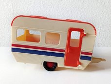 Oranje witte mini caravan