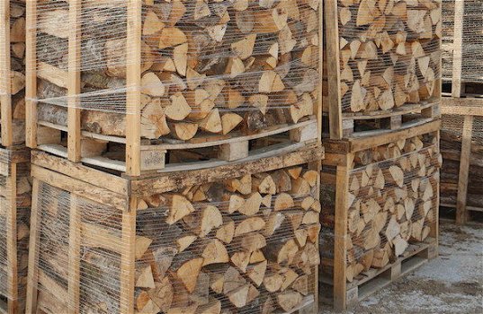 Promotie van brandhout met gratis bezorging. - 1