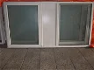 Te koop een prima groot kunststof raam kozijn - 2 - Thumbnail