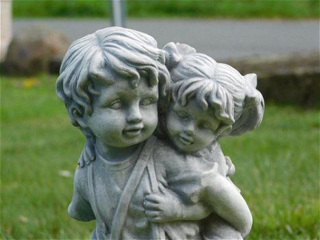 tuinbeeld , jongen en meisje - 0